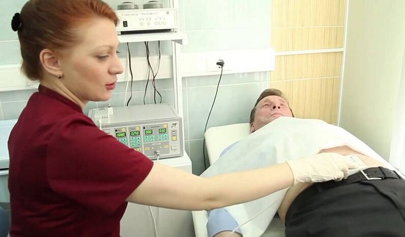 The doctor examines the patient for the diagnosis of prostatitis